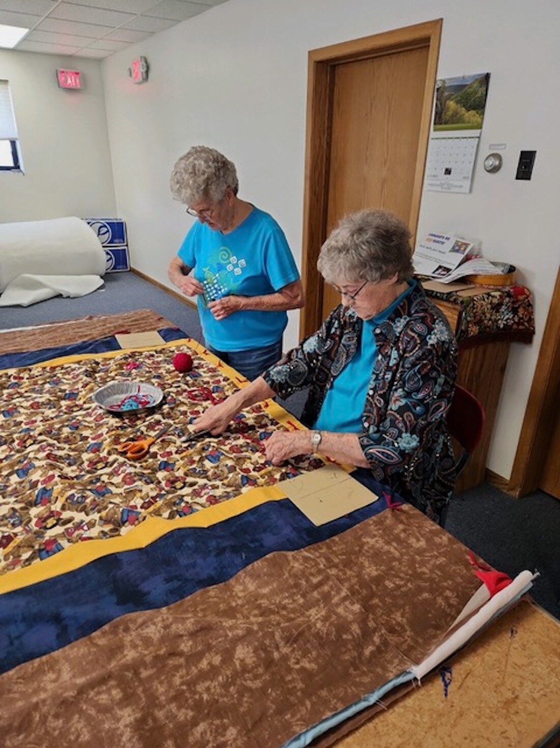 Local Church S Basement Quilting Group Reaches Goal Of Quilts For