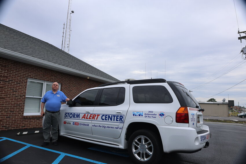 Daniel Wilson’s car serves the Storm Alert Center, and the big antenna mast at his house is for gathering weather information.