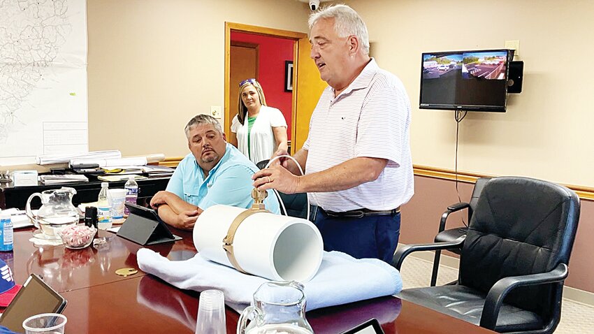 Lenny Stone, who recently retired as general manager at the Columbia Adair Utilities District, showed the board of directors earlier this year how technology allows for broadband fiber to be run inside waterlines.