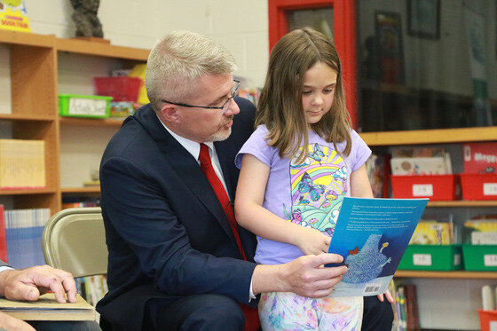 Incoming Commissioner of Education Robbie Fletcher read books to students who are in the Bourbon County Summer Boost Reading program by sharing the importance of being able to read. Photo by Crystal Sicard, Kentucky Department of Education, June 3, 2024