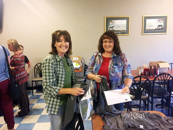 Connie Young and Christine Williams were in attendance at the OCC resource fair Thursday evening at Anderson's pizzeria. The Cane Valley Baptist Church has been active in OCC for several years.