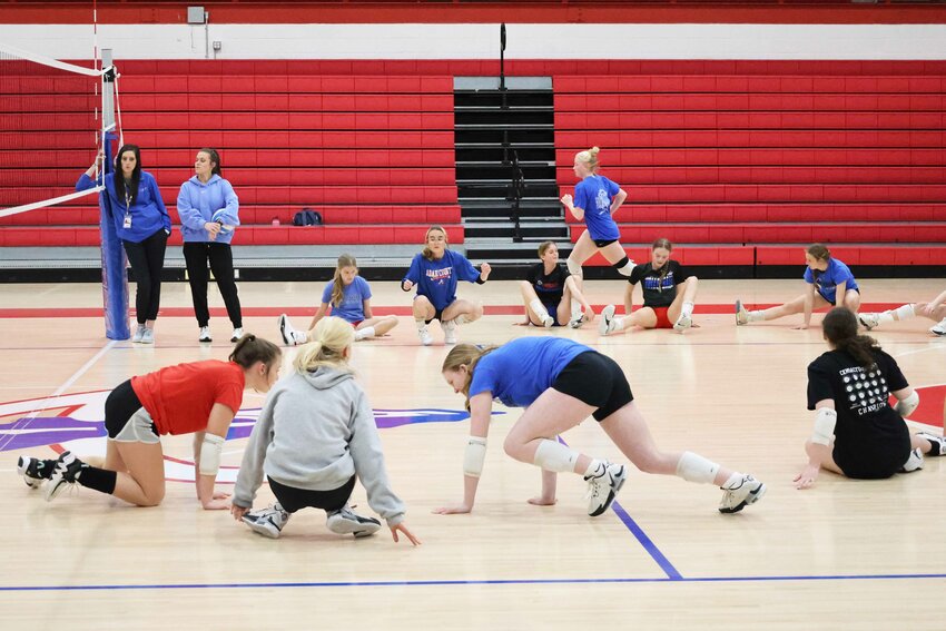 High school head coach Michelle Neat (left) and middle school coach Rachel Houchens supervised the volleyball workouts last week.