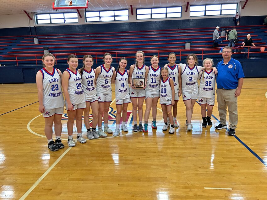 Alexis Eldridge, Konner Houchens, Addison Chapman, Ella Brown (Tournament MVP), Makayla White, Mattie Wethington, Paisley Shehan, Kaylence Bennett, Ila Loy, Kailyn Shepherd, Makayla Miller, and Coach Mike Sneed after winning the eighth grade championship at CKMSAC.