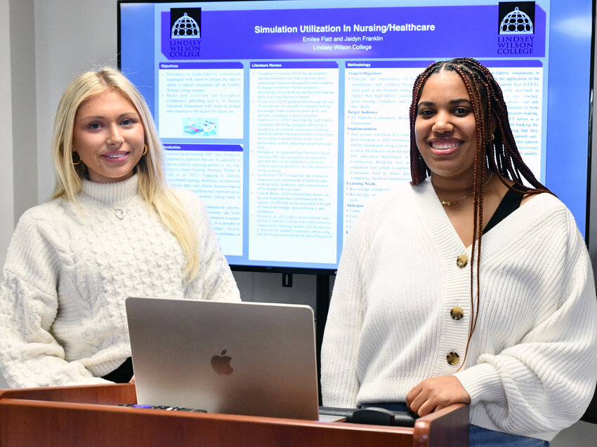 At the Friday morning presentations of the Lindsey Wilson College “Leadership in Nursing” final 2025 spring semester class in the Dr. Robert and Carol Goodin Nursing & Counseling Center, seniors Emilee Flatt of Columbia, left, and Jaidyn Franklin of Glasgow,  presented their research, titled “Simulation Utilization in Nursing/Healthcare.”