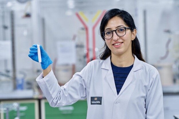 Dr. Bhavna Tandon, Chief Scientific Officer at Brown Foods, unveils a test-tube full of UnReal Milk — the world’s first lab-made whole cow milk, at Brown Foods’ lab in Boston, MA.
