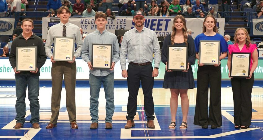 Agriculture Commissioner Jonathan Shell awarded six Kentucky high school student-athletes 2025 Kentucky High School Athletic Association-Kentucky Department of Agriculture Ag Athletes of the Year awards during the KHSAA Boys’ Sweet Sixteen® State Basketball Tournament at Rupp Arena Friday night in Lexington. Pictured are, from left, Kenton Johnson, Jackson Major, Aiden Manley, Commissioner Shell, Abby Knarr, Harper Richey, and Laney Pease. (Kentucky Department of Agriculture)