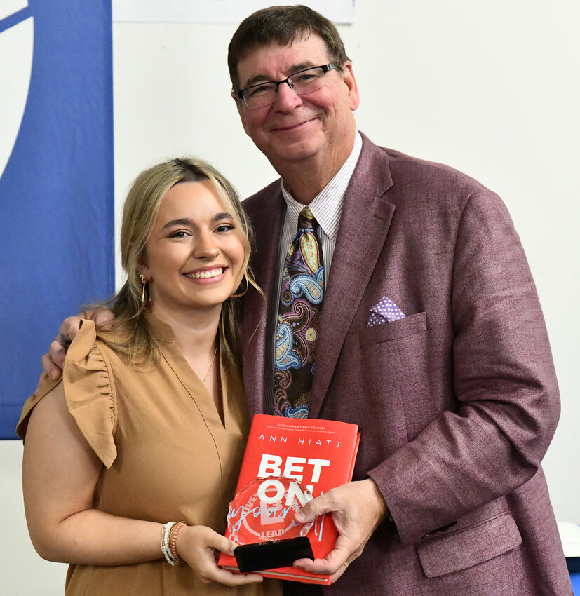 Reilly Wells receives the L3 Award from Lindsey Wilson College President Dr. Bill Luckey.