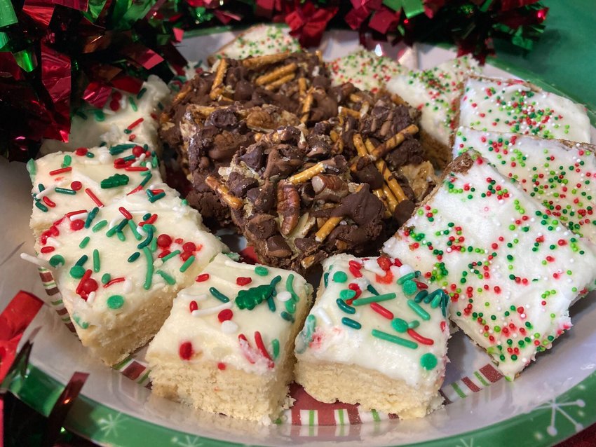 Sugar Cookie Bars (left), Salted Pretzel Bars (center) and Gingerbread Bars make a tasty cookie tray for the holidays.