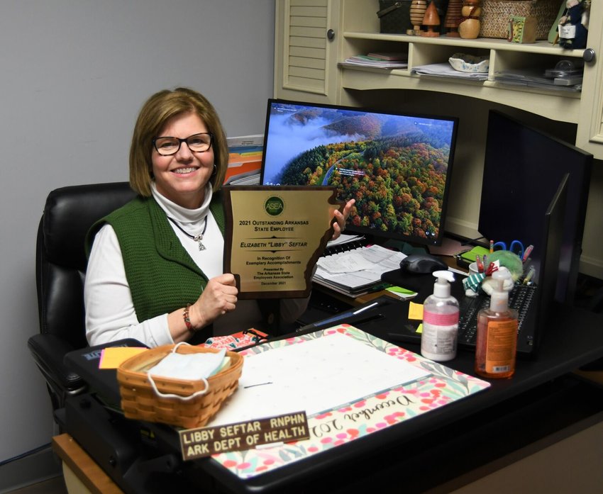 Cotter resident and Mountain Home High School graduate Libby Seftar recently received the Arkansas State Employee Association's Outstanding Arkansas State Employee Award.