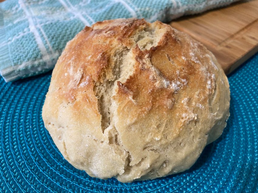 Overnight No-Knead Bread takes a few minutes of prep time, raises overnight and bakes into a crusty, rustic, peasant-like bread.