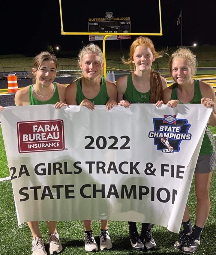 The Yellville-Summit Lady Panthers won the Class 2A State track and field championship for the second straight season Tuesday night at Quitman. Pictured is the 4x400 relay team of Jacey Davenport, Kaylee Martin, KJ Moore and Abby Methvin, who won the event at the meet for the second straight season.