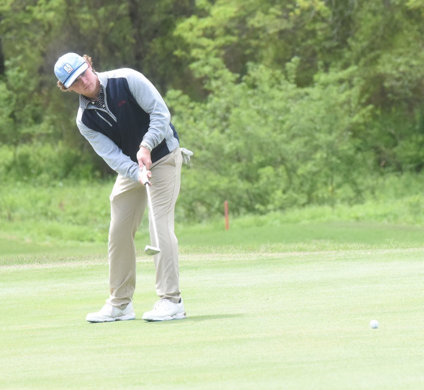 Lyon College's Luke Jackson, of Mountain Home, putts on the 12th green Tuesday at Big Creek Golf &amp; Country Club.