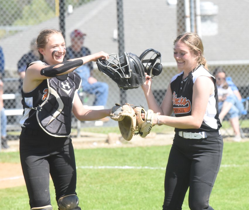 Calico Rock's Ashlyn Mann (left) and Lyrick Stapleton celebrate after their district tournament win against Shirley.