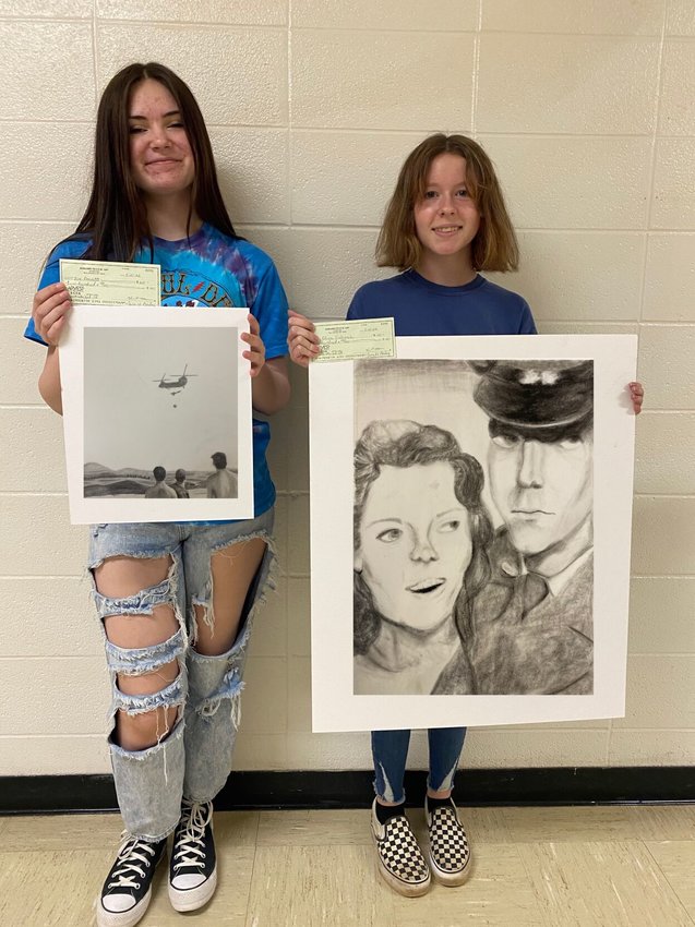 Winners of the Young American Creative Patriotic Arts Competition hosted by the Hovel-Barnett Veteran of Foreign Wars Post 1341 Auxiliary are (from left)&nbsp; Zoe Barnett, 14, first, and Olivia Endres, 15, second. Both are Flippin High School students.&nbsp;   Submitted Photo