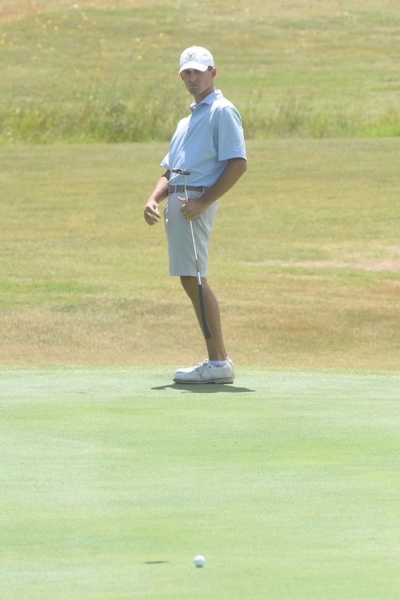 A golfer reacts as his putt narrowly misses on the sixth hole at Big Creek Golf &amp; Country Club during the Arkansas Junior Amateur Championship on Tuesday.