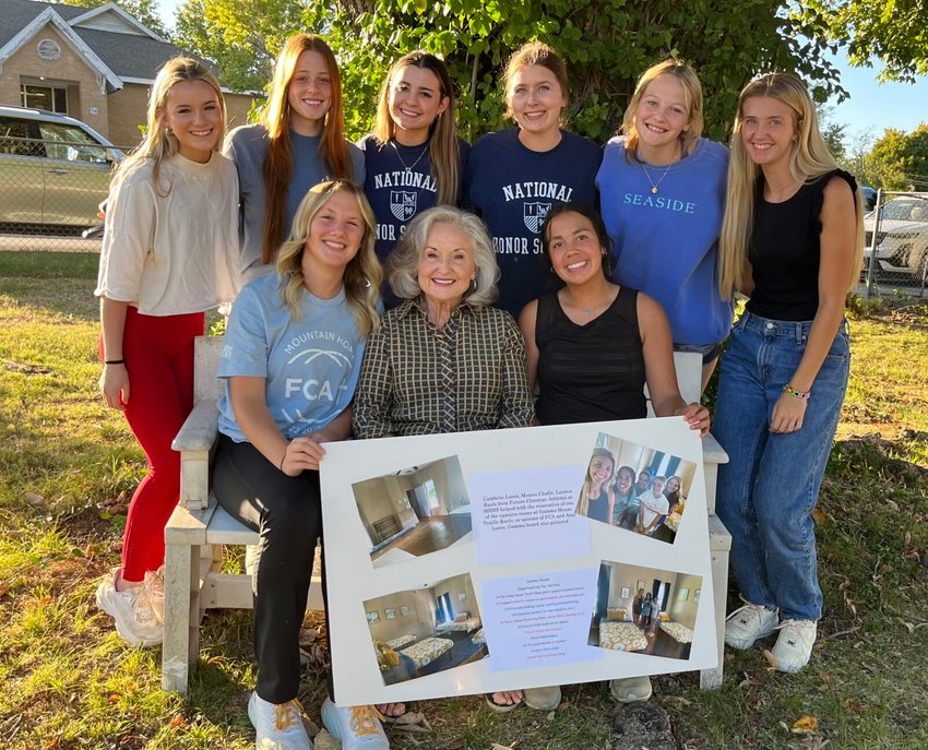 Members of Mountain Home High School Clubs the Fellowship of Christian Athletes and National Honors Society have dedicated volunteer hours to redecorating rooms at the Gamma House women&rsquo;s shelter. Pictured (from left) are, front row: Kiley Horne, Gamma House board member Judith Strother and Monica Chafin. Second row (from left) are: Lauren Rauls, Katie Camp, Camille Pitchford, Whitney Wilber, Jordan Massie and Cambelle Lance.   Helen Mansfield/The Baxter Bulletin