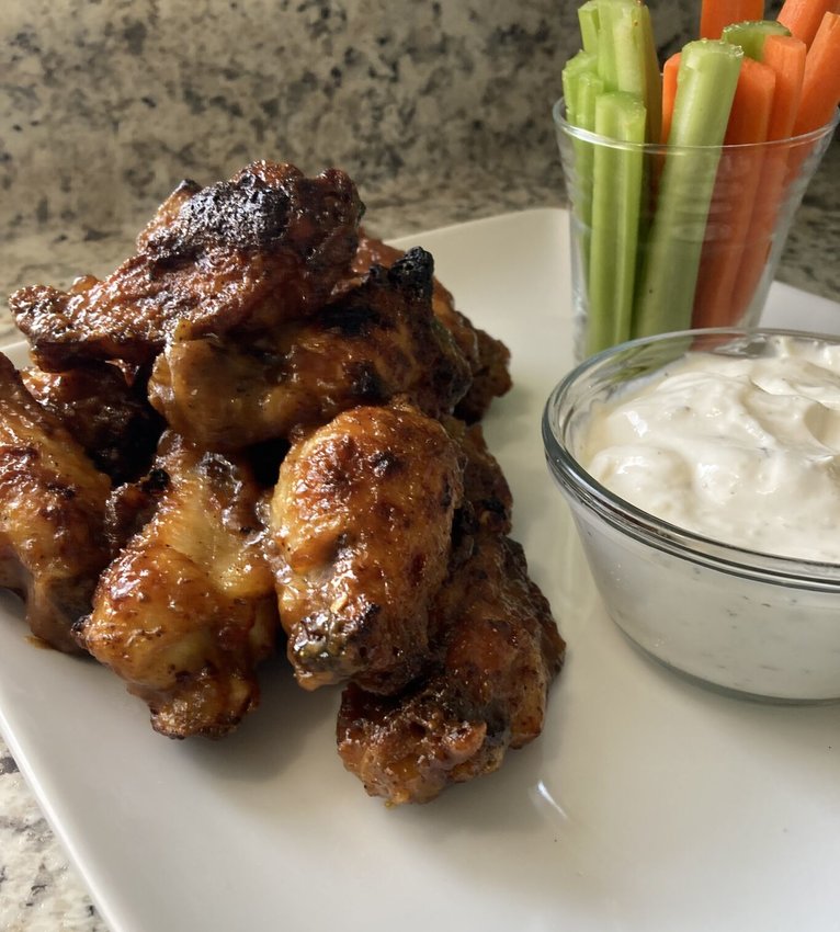 Sticky and spicy with a touch of sweetness, Air Fryer Honey-Mustard Wings are a tasty treat for watching the big game.   Linda Masters/Baxter Bulletin