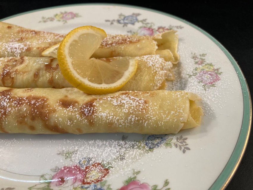 English Pancakes resemble French crepes, but are thicker and not as rich. Traditionally they are served&nbsp; on Shrove Tuesday sprinkled with confectioners' sugar and lemon juice.   Linda Masters/Baxter Bulletin