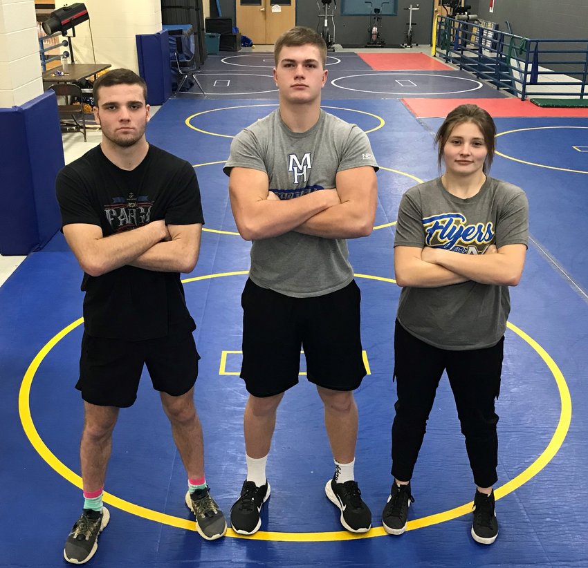 Mountain Home wrestlers Austin Callies, Elijah Lagg and Amelia Frounfelter posted a combined 107-0 record this season, each winning state championships.