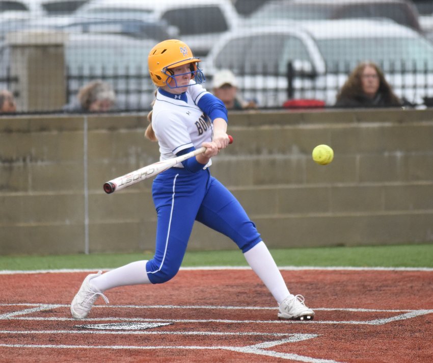 Mountain Home's Brooklyn Arms connects with a pitch during the Lady Bombers' 15-5 win over Valley Springs on Thursday.