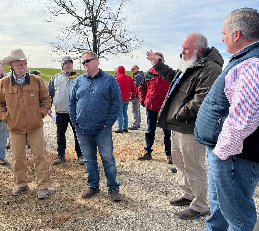 Rusty Janssen (center) listens during a recent public meeting at the NABORS landfill near Three Brothers. Janssen,&nbsp;Senior Vice President of LRS South, has authored an Op-Ed piece to present the company's view on the situation with the landfill property.   Helen Mansfield/The Baxter Bulletin