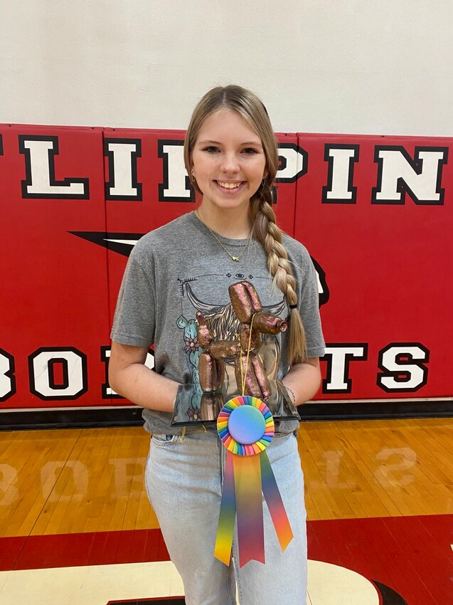 Elle Mitchell won the People&rsquo;s Choice Award at the recent Flippin School Fine&nbsp;Arts Extravaganza. The 16-year-old sophomore completed this ceramic with reflective, iridescent glaze titled &quot;Balloon Dog&quot;, inspired by artist Jeff Koons.   Submitted Photo