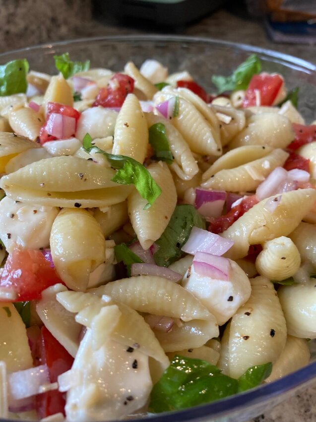 Bruschetta Pasta Salad (shown) combines the ingredients of the classic Italian appetizer, tomatoes, Parmesan cheese, garlic and fresh basil in a cool and delicious pasta salad.   Linda Masters/The Baxter Bulletin