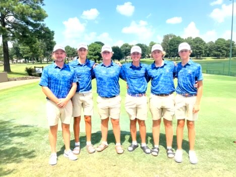 Members of the Bomber golf team, pictured with assistant coach Nick Coleman, finished third at the Jonesboro Hurricane Invitational on Friday.