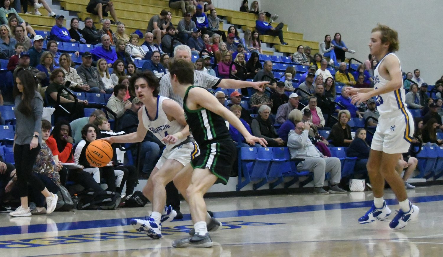 An image from the Mountain Home-Greene County Tech senior boys game played Wednesday in the Ultimate Auto Group Invitational at The Hangar.