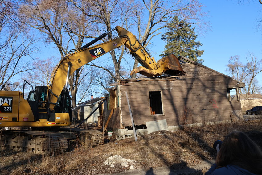 Volunteer crews begin demolition work on a blighted property in the Aetna Neighborhood in Gary. Officials announced that the second phase of an initiative to revitalize the city will continue through 2025.
