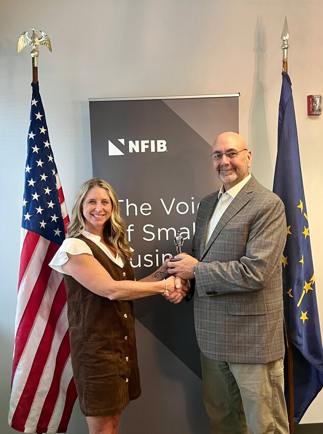 Natalie Robinson (left), Indiana state director of the National Federation of Independent Business (NFIB), presents the NFIB Guardian of Small Business Award to state Rep. Stephen Bartles.