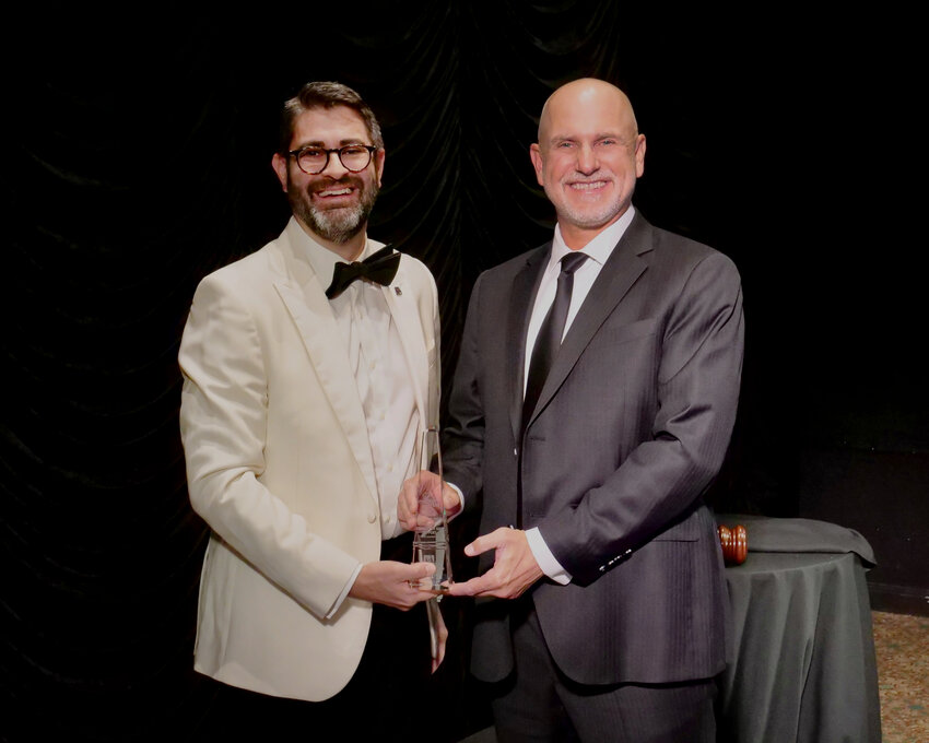 Dax Denton (left), chief policy officer for the Indiana Bankers Association, presents State Sen. Scott Baldwin, R-Noblesville, with the IBA 2024 Legislator of the Year award at the Association's Annual Convention in French Lick, Ind.