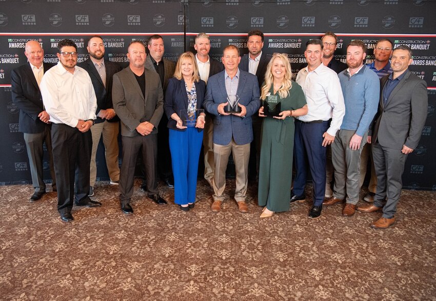 Employees of Superior Construction pose with their awards they received during the annual awards banquet held by the Northwest Indiana Business Roundtable and the Construction Advancement Foundation.