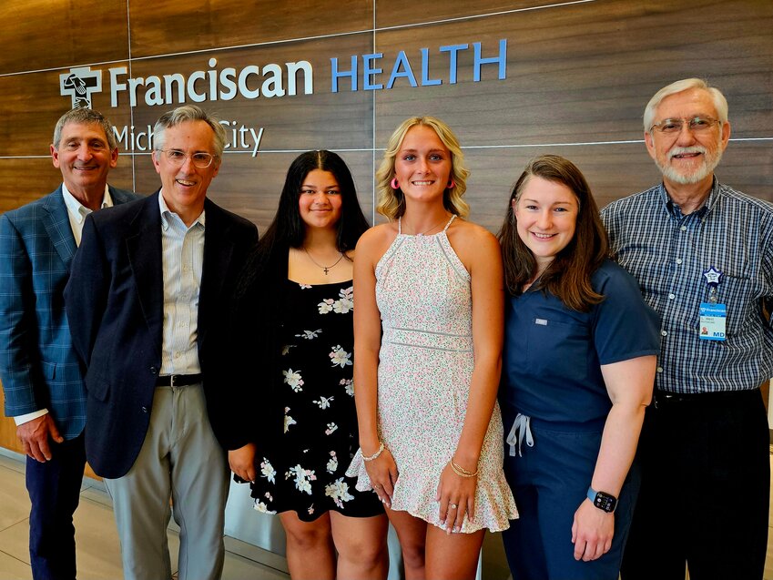 Members of the Franciscan Health Michigan City Medical Staff Scholarship Committee recently gathered to congratulate the 2025 scholarship winners. Pictured (l-r) are Dr. David Fumo, Dr. Matthew Troy, scholarship winner Naomi Williams, scholarship winner Caloe Peretti, Dr. Sandra Wischmeyer and Dr. Samuel West.