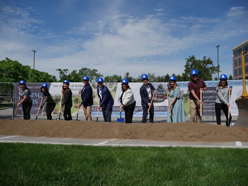 Pictured during the Carmel Gateway East Lawn groundbreaking are (from left): Rebecca Price, Community Manager, Carmel Gateway; Angelina Conn, Planning Administrator, City of Carmel; Christina Jesse, Planning Administrator, City of Carmel; Jeremy Kashman, Chief Infrastructure Officer, City of Carmel; Patrick Moyers, Carmel Gateway Property Manager; Carmel Mayor Sue Finkam; Brian Simel, VP of Rubenstein Partners LP; Rachel Keesling, Planning Administrator, City of Carmel; David Littlejohn, Alternative Transportation Coordinator, City of Carmel; and Kennedy Gallagher, Marketing Manager, Carmel Gateway.