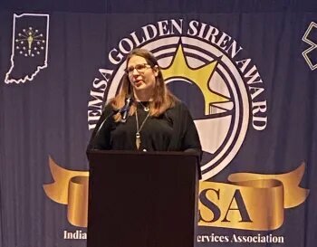 Emergency Physician Emily Kraft, MD, speaks at the IEMSA Golden Siren Award Banquet. Kraft serves as the EMS Medical Director at Reid Health.