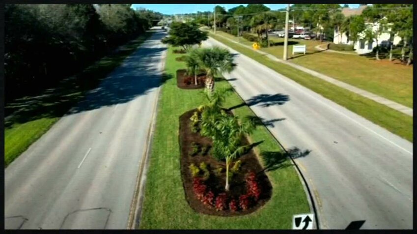 Example photo shown by Manatee County Property Management Interim Director Carmin DeMilio of Palma Sola Causeway median improvements. DeMilio told commissioners that the five medians the county would be taking over from the City of Bradenton between 43rd Street and 75th Street along Manatee Avenue would be improved to match.