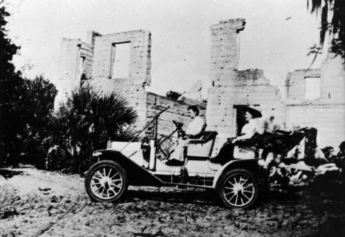 Automobile driving by Braden Castle ruins circa 1915.