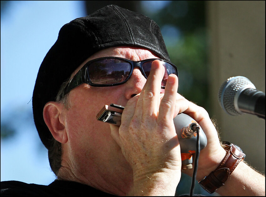 "Rockin Jake" Jacobs and his band from southern Florida opens the Blues in the District with his blues style harmonica to a large crowd in Washington Park Friday.  (H-W Photo/ Michael Kipley)