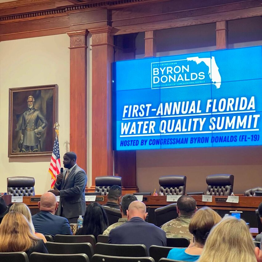 U.S. Rep. Byron Donalds addresses his secret water quality summit in the Lee County Commission chambers (note the portrait of Robert E. Lee) via Facebook with permission.