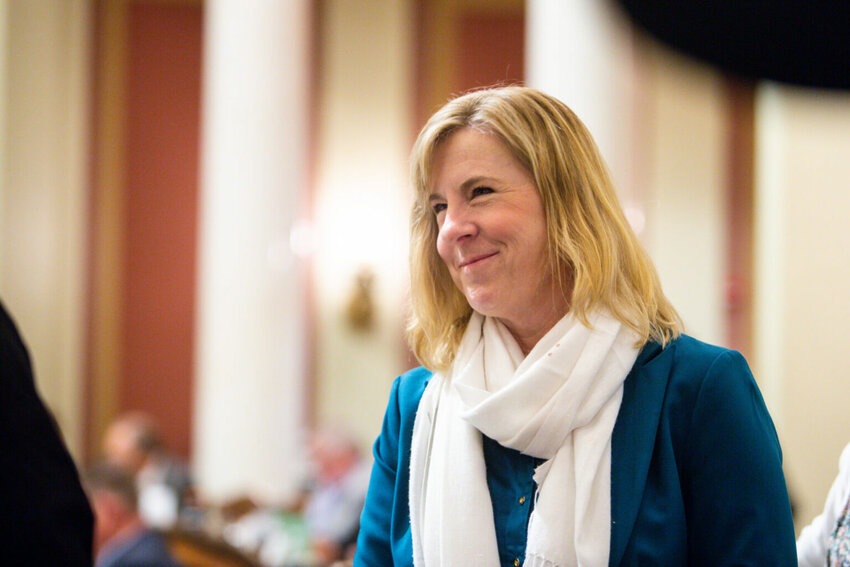 Speaker emeritus Rep. Melissa Hartman talks to colleagues during a special legislative session Monday, June 9, 2025 at the Minnesota State Capitol in St. Paul. (Photo by Nicole Neri/Minnesota Reformer)
