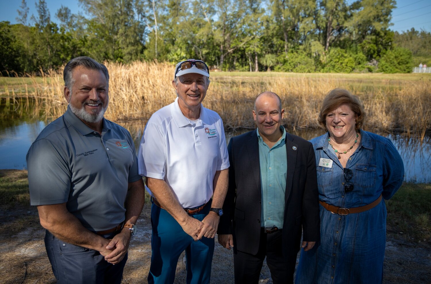 Manatee County Commission Chair Mike Rahn, Natural Resources Director Charlie Hunsicker, Commissioner Van Ostenbridge, and Bradenton City Councilwoman Jayne Kocher.
