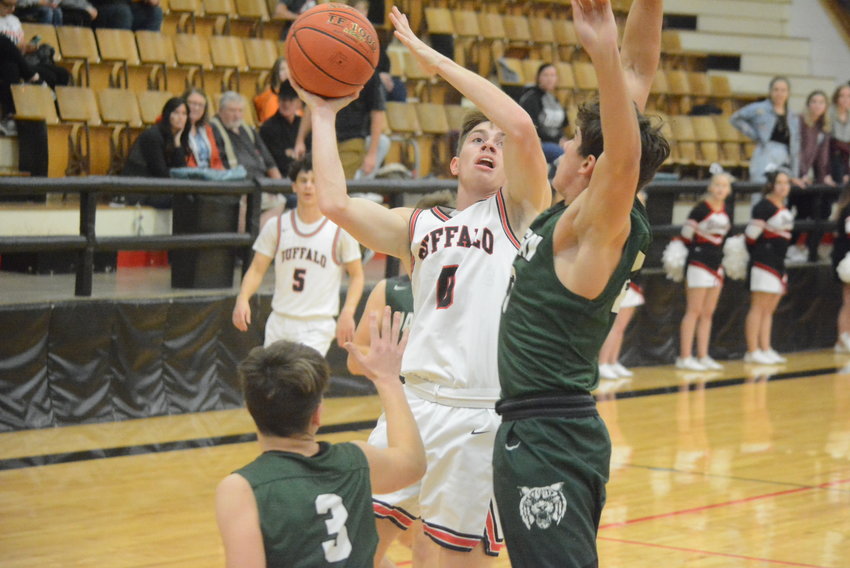 Cameron Portis goes up for a basket against Warsaw. He finished the game with 16 points and nine rebounds.