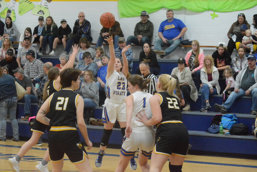 India Willis (23) gets off a shot against Fair Play, as Molly Phillips (1) screens out one defender. Willis finished with 28 points and also posted her 500th point of the season.