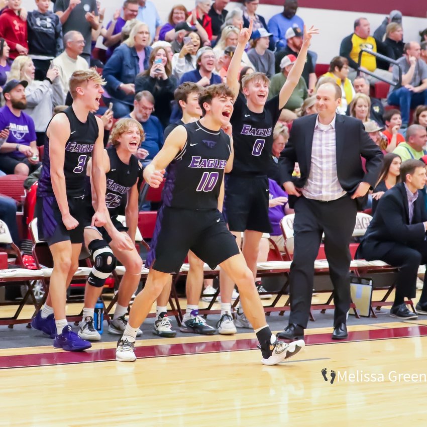 These four Fair Grove seniors celebrate the district championship as head coach Bryan Tucker looks on with satisfaction. Pictured are, from left, Ryan Berry, Devin Carroll, Kody Stacye and Josh Orr.