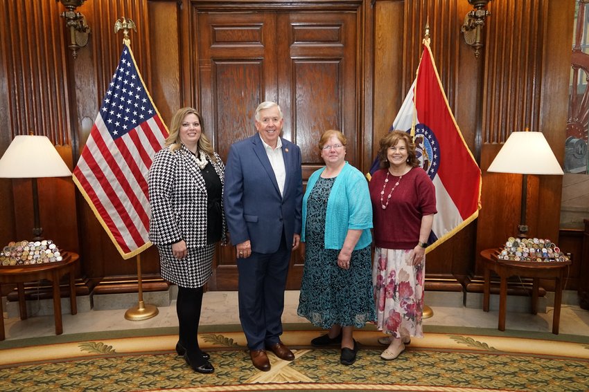 Gov. Mike Parson met with government leaders from the Missouri School Boards&rsquo; Association, the Missouri Municipal League, the Missouri Association of Counties and the Missouri Local Government Employees Retirement System on the afternoon of May 2 to present a proclamation recognizing that week as Local Government Week in Missouri. Pictured are members of the Missouri Association of Counties with the governor, from left: Batina Dodge, president of MAC and Scotland County clerk; Parson; Carol Johnson, treasurer of MAC and Dallas County public administrator; and Lori Smith, MAC president-elect and Adair County treasurer.