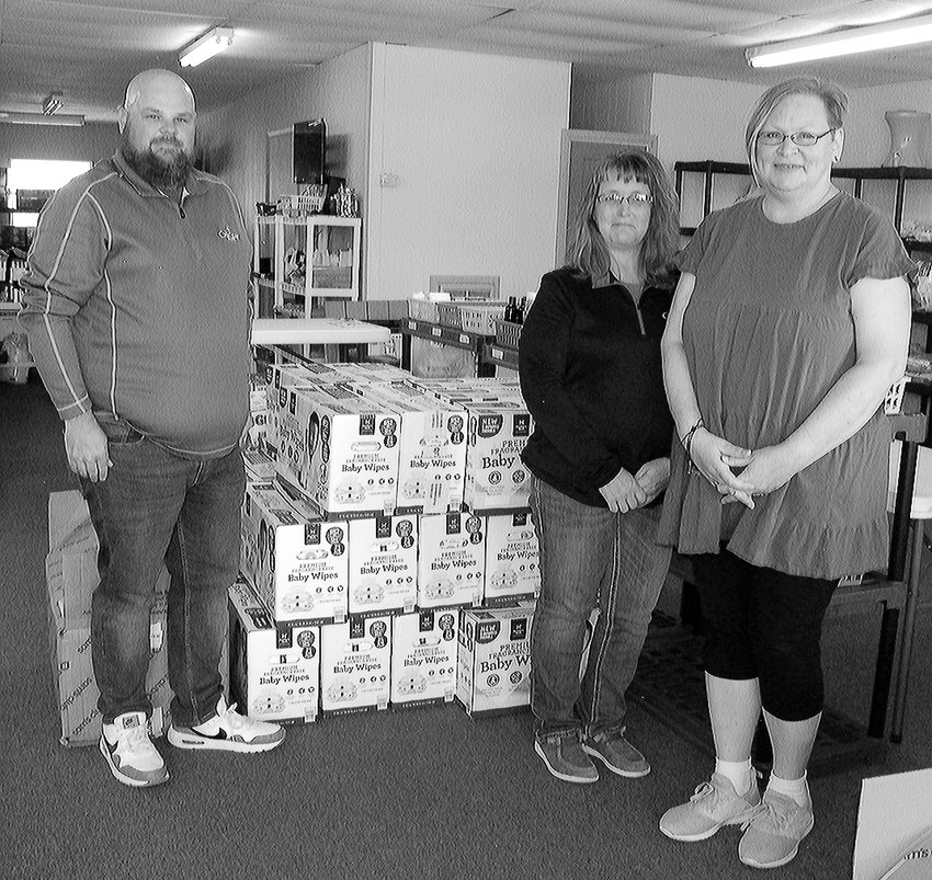 After the drop-off of donations at The Haven in Buffalo, pictured are, from left, Randell Boggs and Terri Reed of OakStar Bank, and Carrie Hulsey of The Haven.