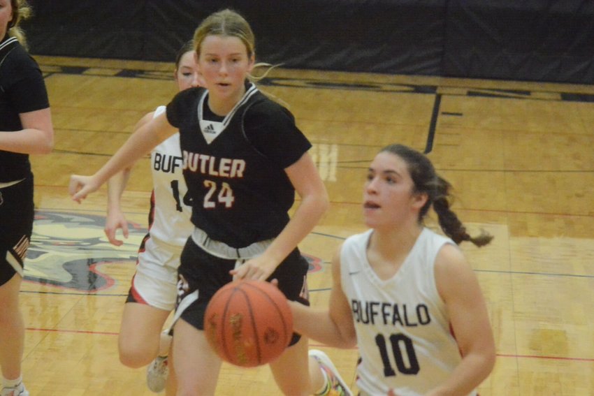 Addy Armstrong heads for the basket after a steal against Butler.   Reflex photo by Paul Campbell