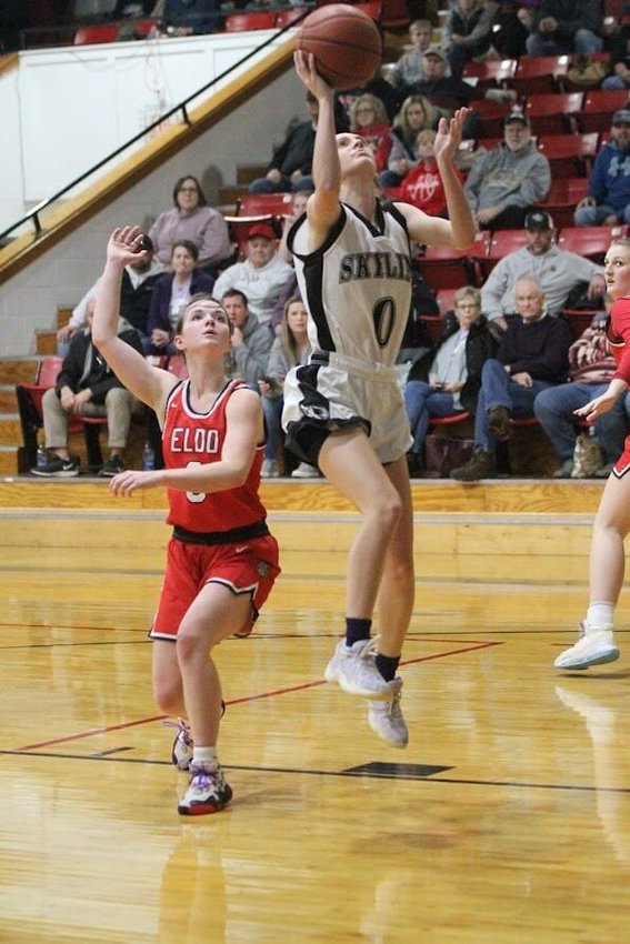 Sadie Redd goes up for a basket against El Dorado Springs. She finished with five points against the Lady Bulldogs and later in the week tallied nine against Lamar.   Reflex photos by Kelli Cheek