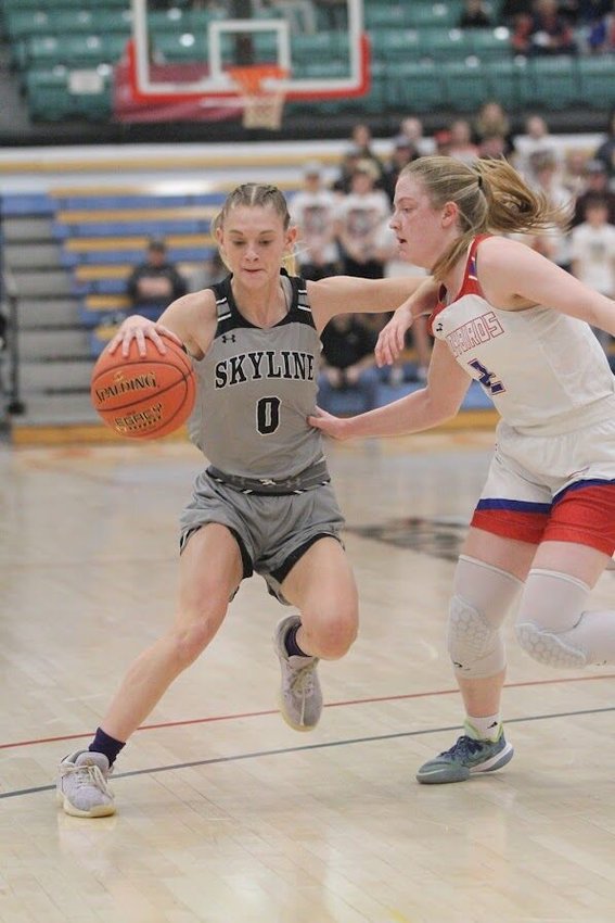 Sadie Redd (0) certainly would be a nominee for most improved Skyline player over the season. She has always been good at defense and ball handling, but scored 10 points against South Shelby.   Reflex photos by Kelli Cheek